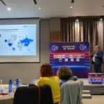 Global business presentation on e-commerce growth and international markets at Transart conference.